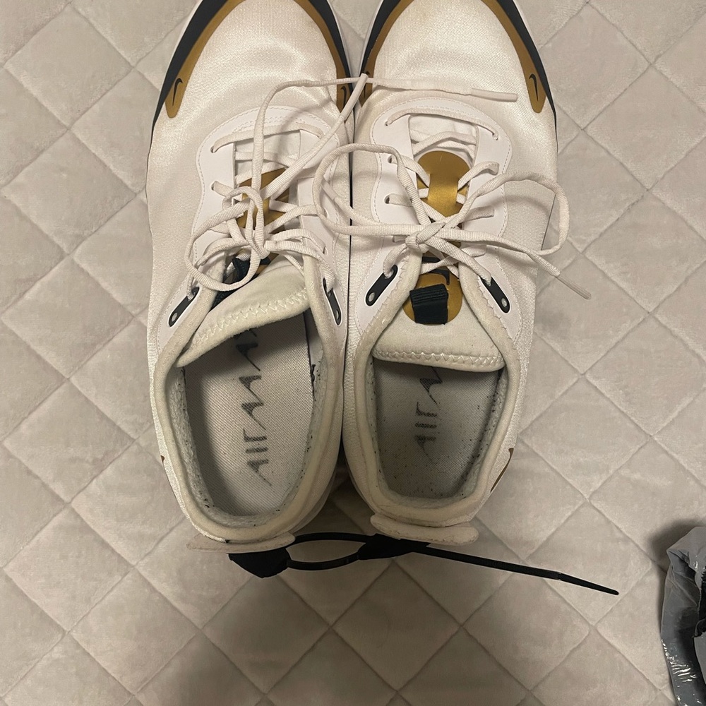 Nike White Sneakers with Gold Details